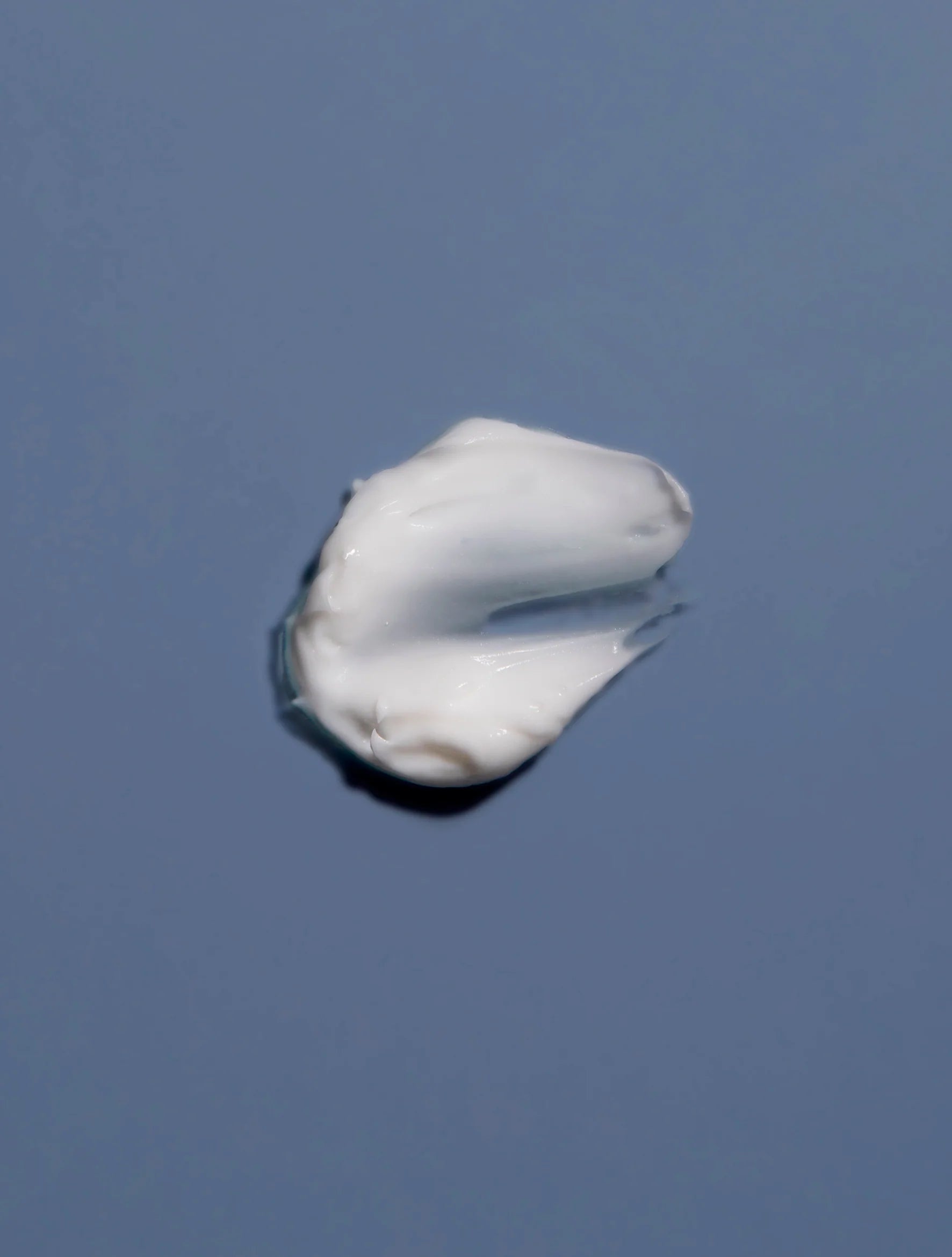 GoNightly night cream texture on blue background