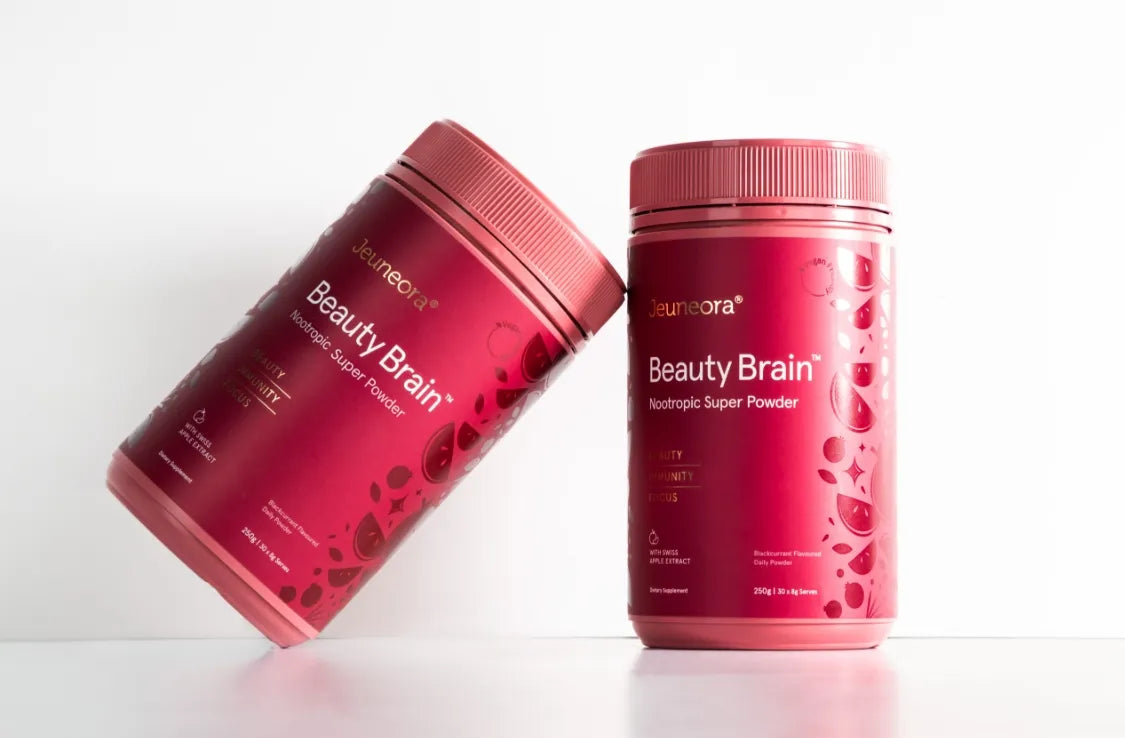 Two containers of Beauty Brain Nootropic Super Powder on a white background.